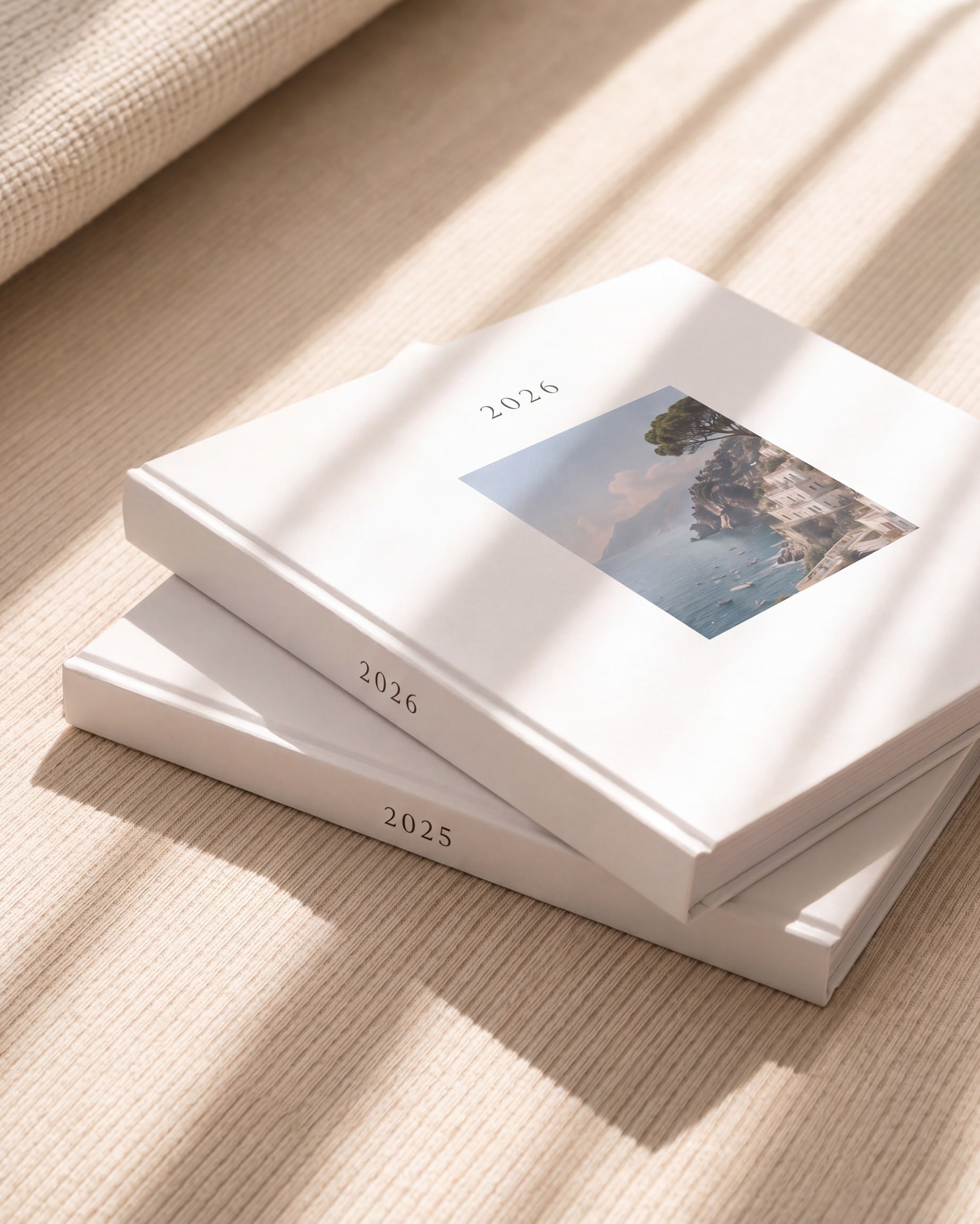 Open hardcover yeerbook spread with travel photos and handwritten friend signatures